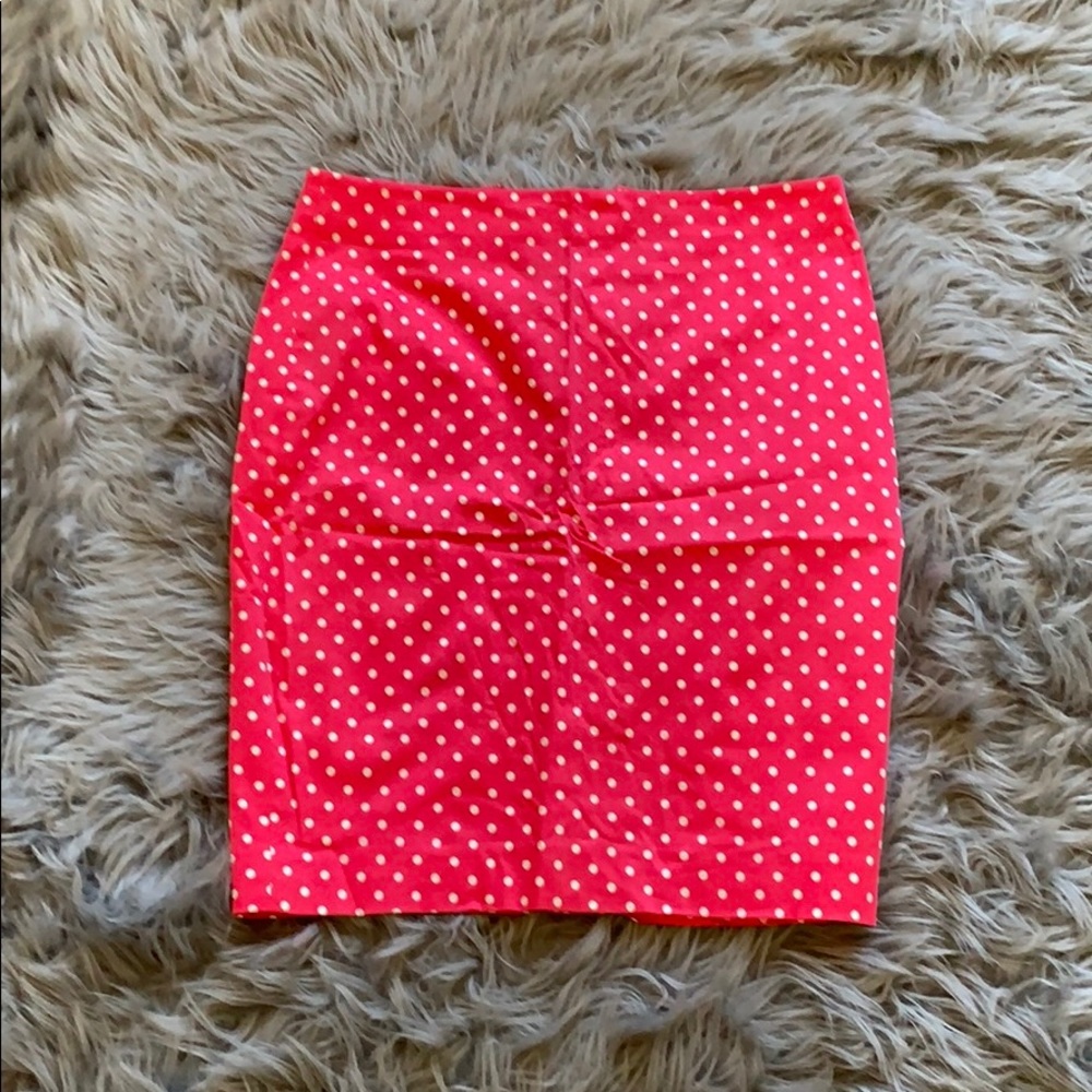 Salmon with white pock a dot skirt